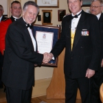 Mr. Rob Baxter receives the Commendation from Col Hutchings for his contributions to the success of the sesquicentennial.